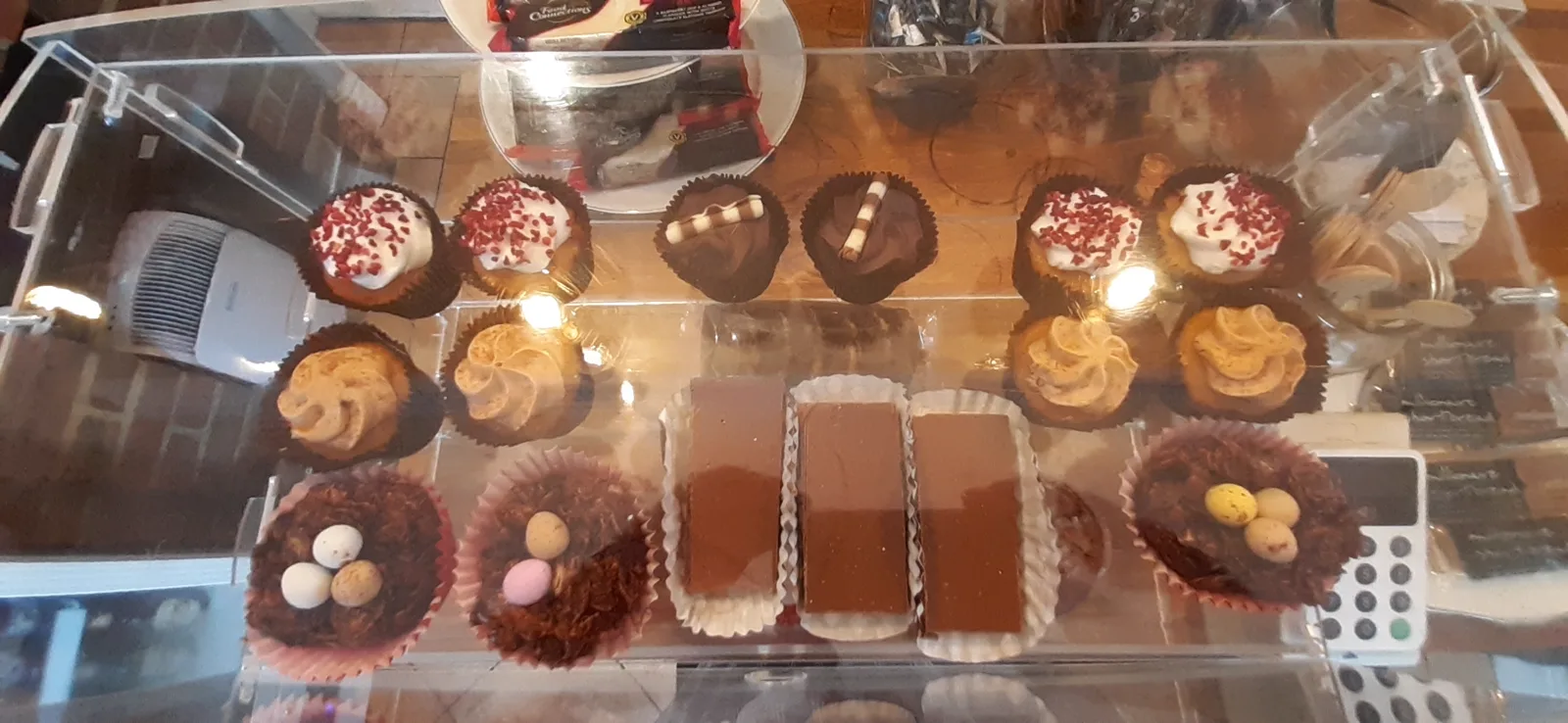 The cake and treat display counter at Dennie's Cafe