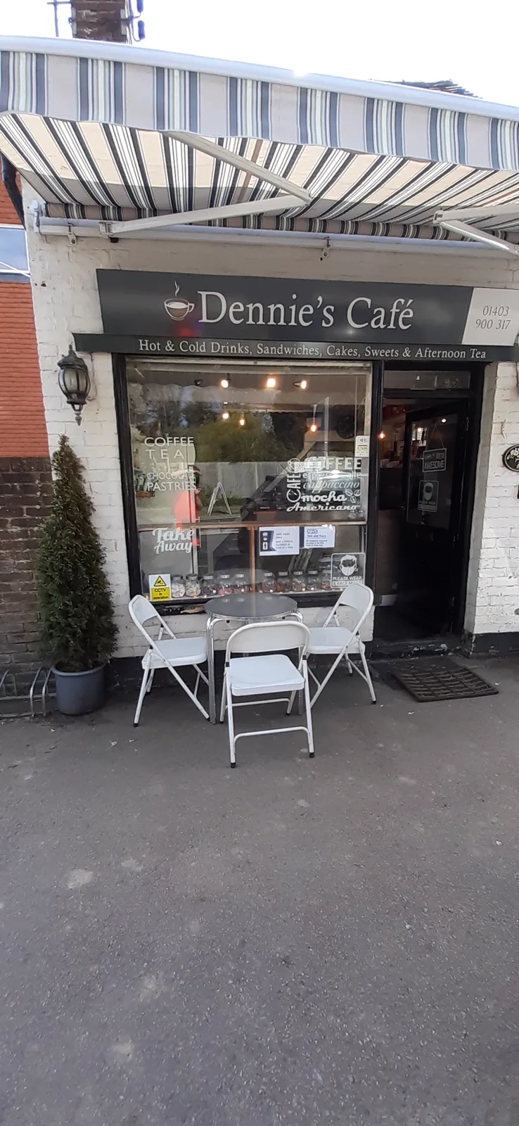 Outdoor seating outside Dennie's Cafe