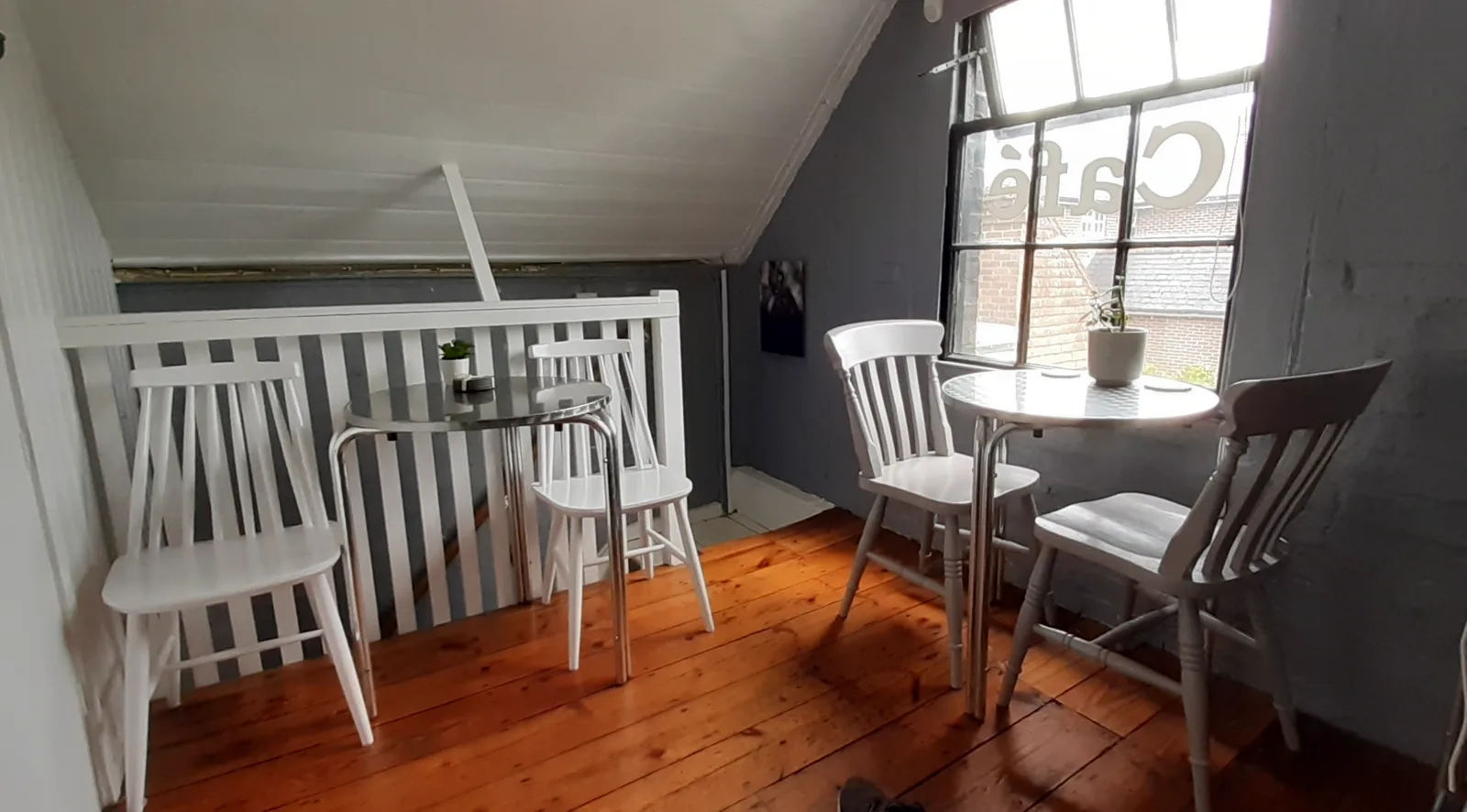 Another view of the upstairs seating area at Dennie's Cafe